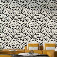 An interior with a fun and artistic accent wall

