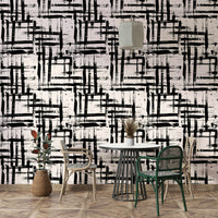 An angled shot of a wall with a painted wallpaper

