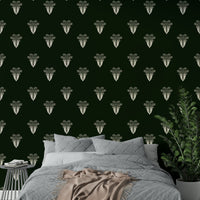 The wallpaper is used to create a feature wall in a dining room.