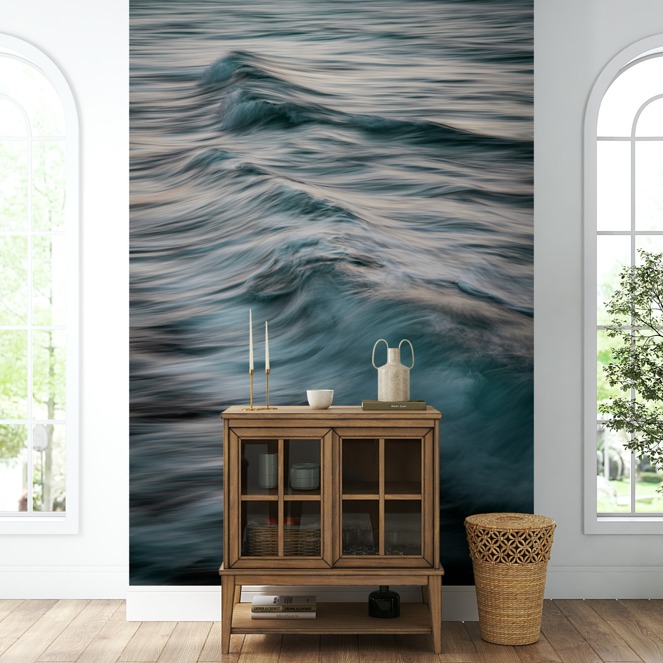 A contemporary living room with a large ocean wave wall mural.

