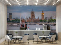 A close-up of the detailed city lights reflecting on the water.

