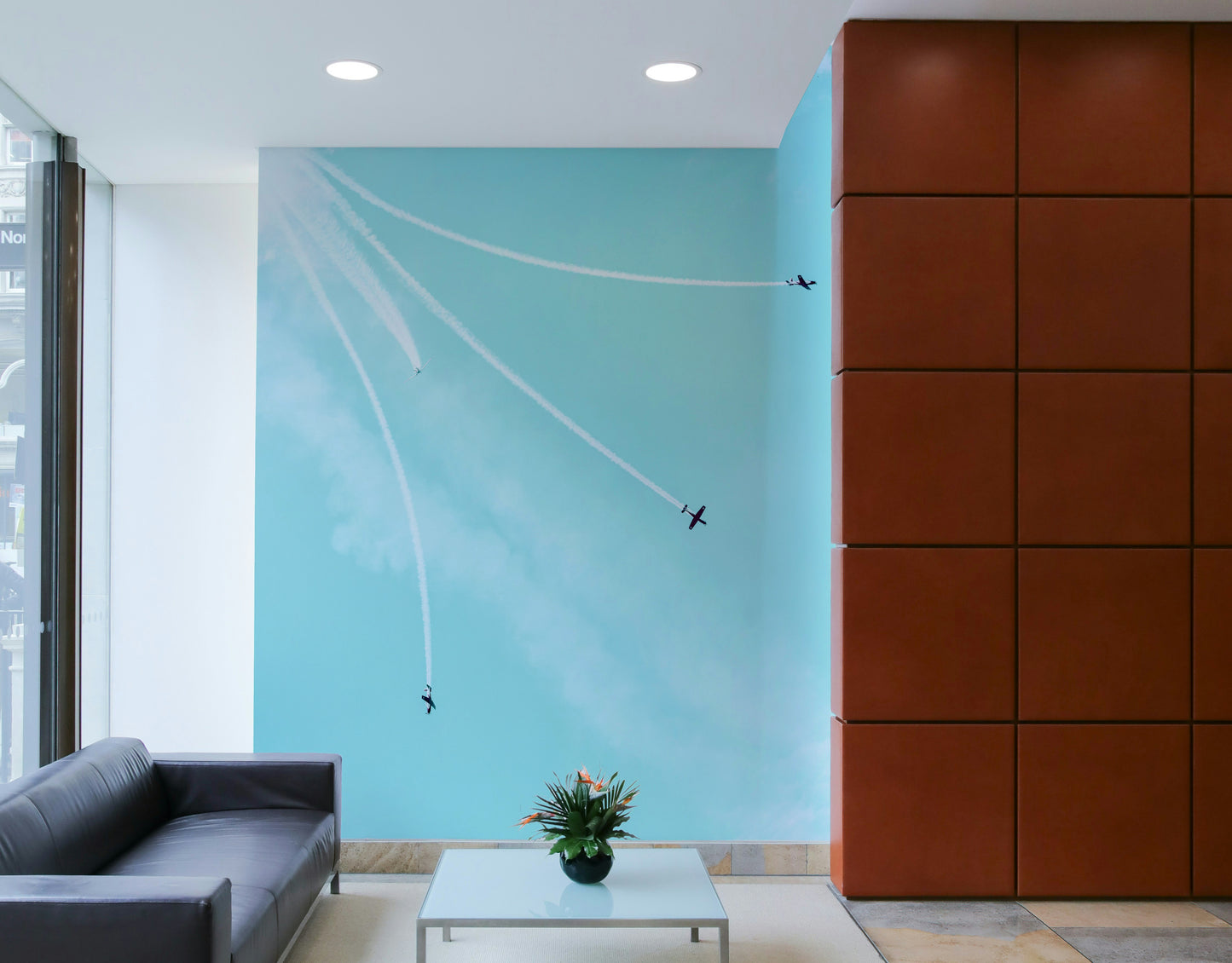 The wallpaper is used as a feature wall in a bedroom.