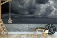 A beautiful coastal rock wallpaper mural with crashing waves.

