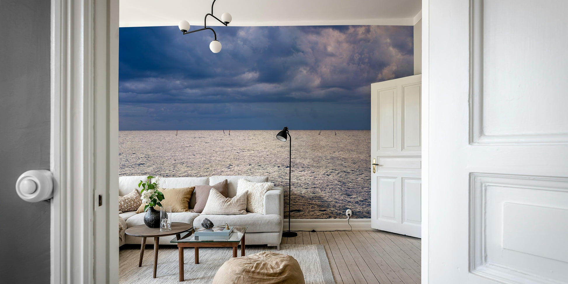 A beautiful coastal rock wallpaper mural with crashing waves.


