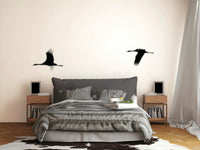 A peaceful Asian-inspired mural on decorative wallpaper.

