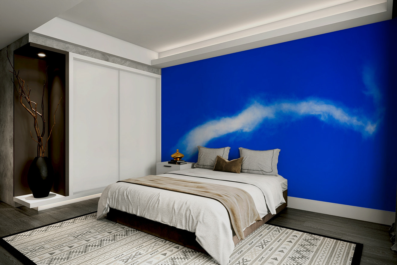 A beautiful blue sky wallpaper mural with soft clouds.

