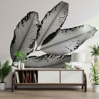 A peaceful woodland scene mural on decorative wallpaper.

