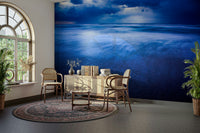 An artistic rough sea mural on minimalist wallpaper.

