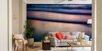 A beautiful wide-angle wall mural of a lone fisherman.

