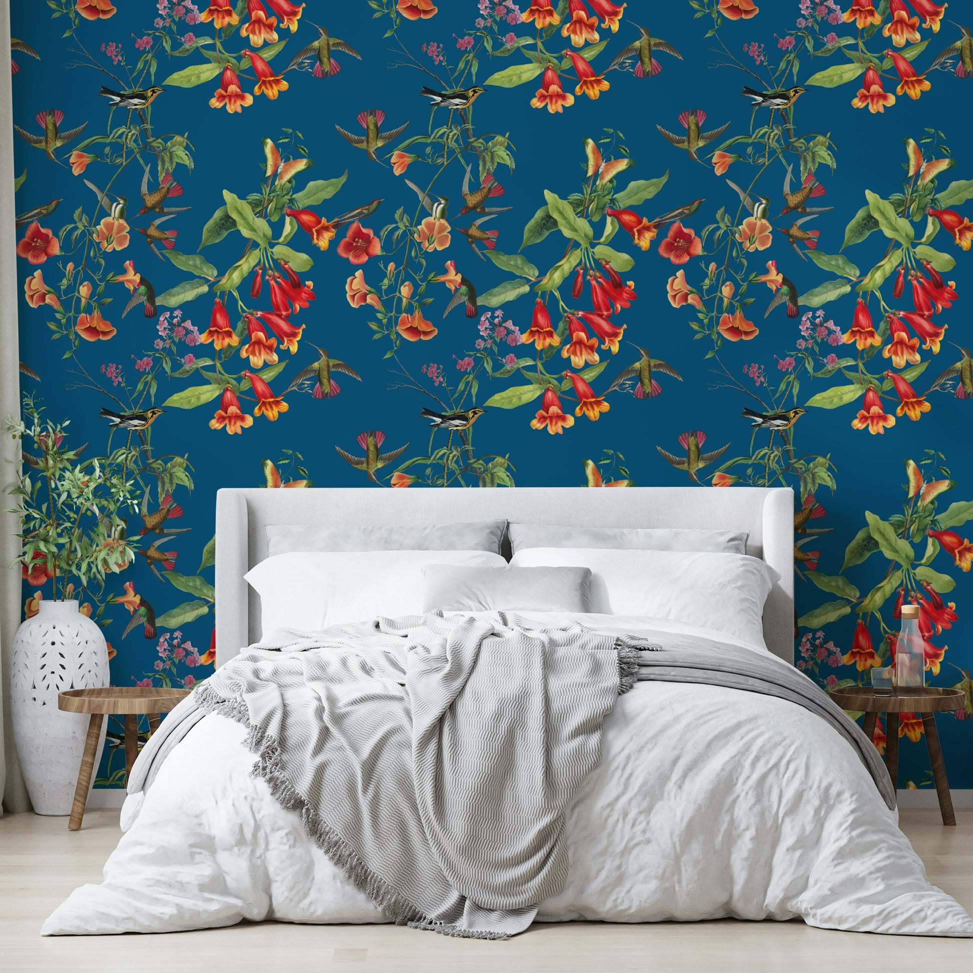 A calming foliage design wallpaper mural that defines a space.

