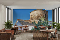 A beautiful island chapel wallpaper mural on a seaside cliff.


