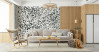 A contemplative dramatic splatter wallpaper mural for a feature wall.