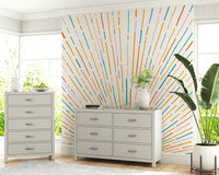 A calming abstract design wallpaper mural that defines a space.