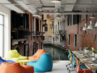 Venetian Canal Vista Wall Mural — tranquil waters and historic Venetian buildings in warm tones.