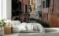 Wall mural depicting Venice’s canals with gondolas, bridges, and vibrant architecture.