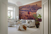 Sunrise Over Cappadocia Wall Mural – Atmospheric mural with glowing skies, valleys, and floating balloons.