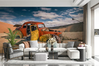 Sunset Desert Wall Mural – Warm, atmospheric mural showing bicycles amidst sandy dunes under a glowing sky.