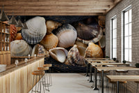 Beach-themed wall mural with soft sand, shells, and gentle ocean waves.