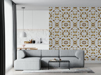 Golden geometric wallpaper with layered triangle shapes adding a rich, stylish accent wall.
