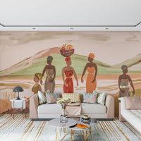 Wallpaper of African women in bright traditional attire carrying baskets of fruits and crops.