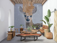Wall mural depicting a calm fawn in soft snowy surroundings for cozy interiors.