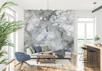 Decorative mural featuring worn stone surfaces in neutral, earthy hues.