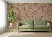 Playful tropical wall art of monkeys in a serene blush-colored grove