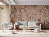 Charming jungle-inspired mural with monkeys in a soft pink tropical scene