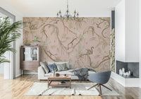 Lively mural of monkeys climbing trees surrounded by blush-hued foliage