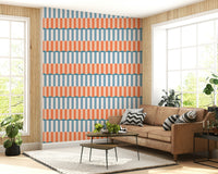 Gentle ocean waves glowing under a warm sunset sky with soft pastel clouds.