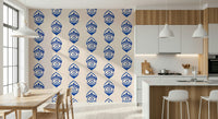Repeating indigo eye shapes forming a bold, modern abstract mural.