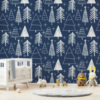 A holiday-themed wallpaper with scattered winter tree outlines in soft white tones.