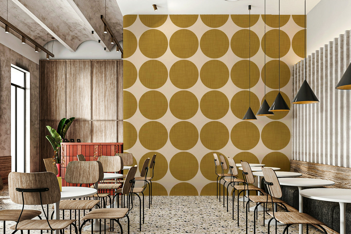 Beige wallpaper decorated with large ochre dots that display a subtle fabric-like weave