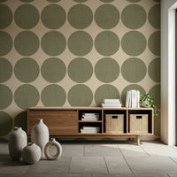 Decorative dot wallpaper with uniform olive circles creating a playful repeating pattern