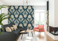 Stylized botanical pattern featuring symmetrical blooms and curved leaves in beige and teal