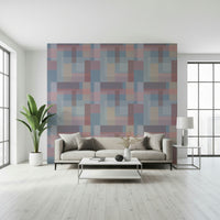 A pastel geometric wallpaper made of soft-edged rectangles arranged in a repeating pattern.