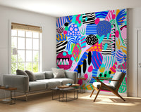 A lively wallpaper showcasing bold geometric and organic forms in a joyful mix of colors.