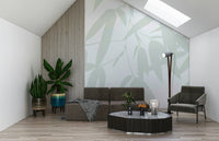 A light botanical wallpaper with softly shaded bamboo leaves for a calm, natural aesthetic.