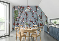 The wallpaper highlights elegant cherry blossoms arranged on dark branches for a refined floral look.