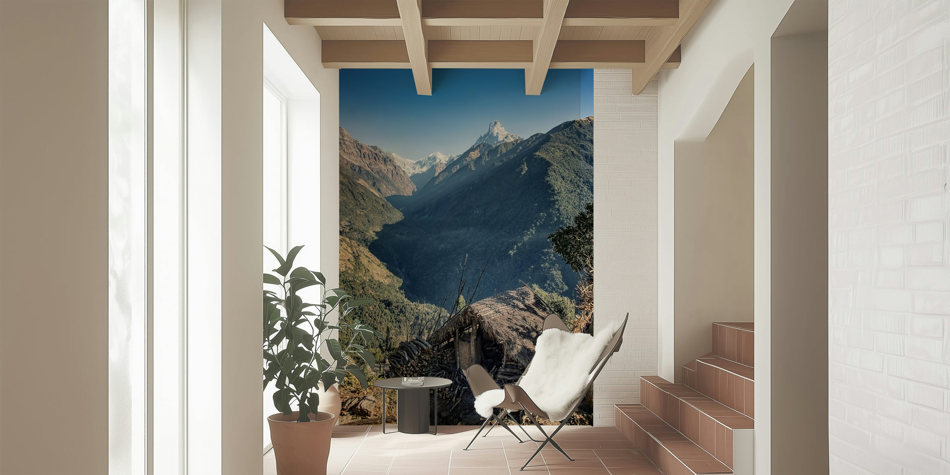 Rustic hillside mural with a thatched shelter and sweeping mountain scenery.