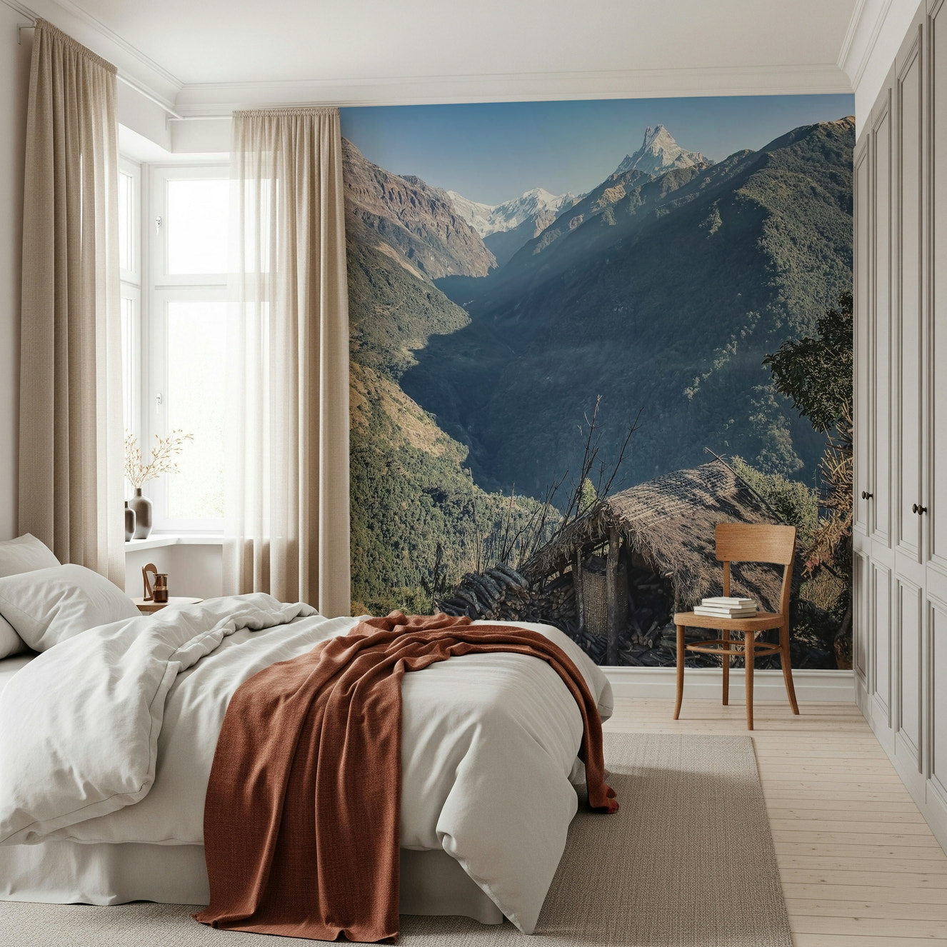 Mountain hut vista wall mural featuring a rustic hut overlooking deep green valleys and towering peaks.