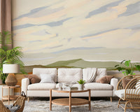 Vibrant landscape mural wallpaper capturing breezy day on grassy slopes.