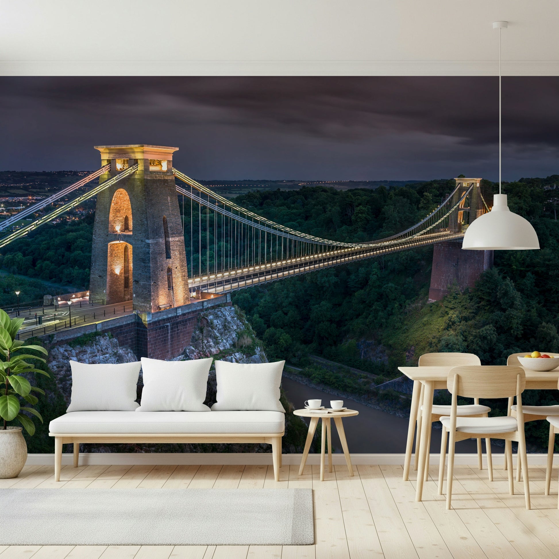 Wide perspective showing Clifton Suspension Bridge spanning Avon Gorge.
