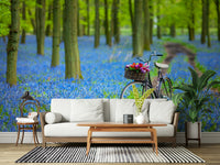 Awesome Bluebell Bike Ride artwork, fresh green leaves creating depth.