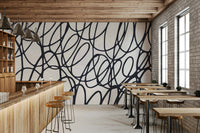 Loop Lines doodle wallpaper. Intricate black pattern for modern walls. Fascinating wall design.