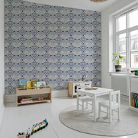 Shell motif wallpaper enhancing a nursery interior space