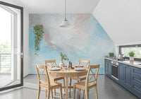 Ethereal wall mural in a dining room with cream linen seating