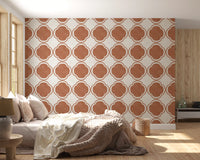 Clay tone geometric wallpaper placed in cozy bedroom feature area