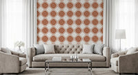 Warm terracotta quatrefoil wallpaper defining a cozy living  space