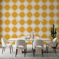 Warm yellow patterned wallpaper arranged in Dining room interior